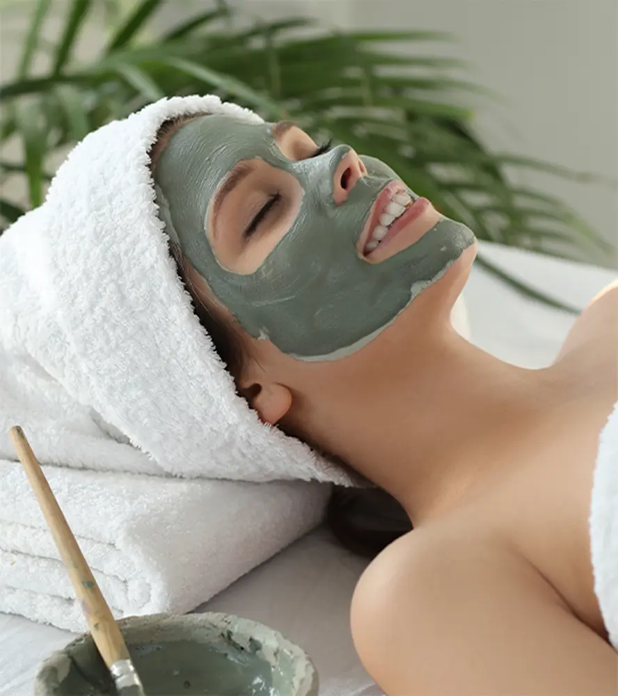 woman receiving beauty treatment skin care